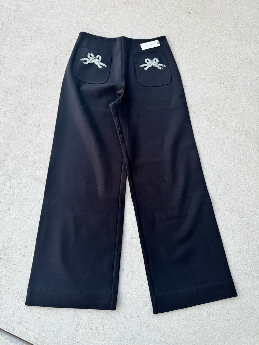 Anthropologie Black Wide-Leg Trousers;Sequin bow pockets- NWT size 29; Maeve